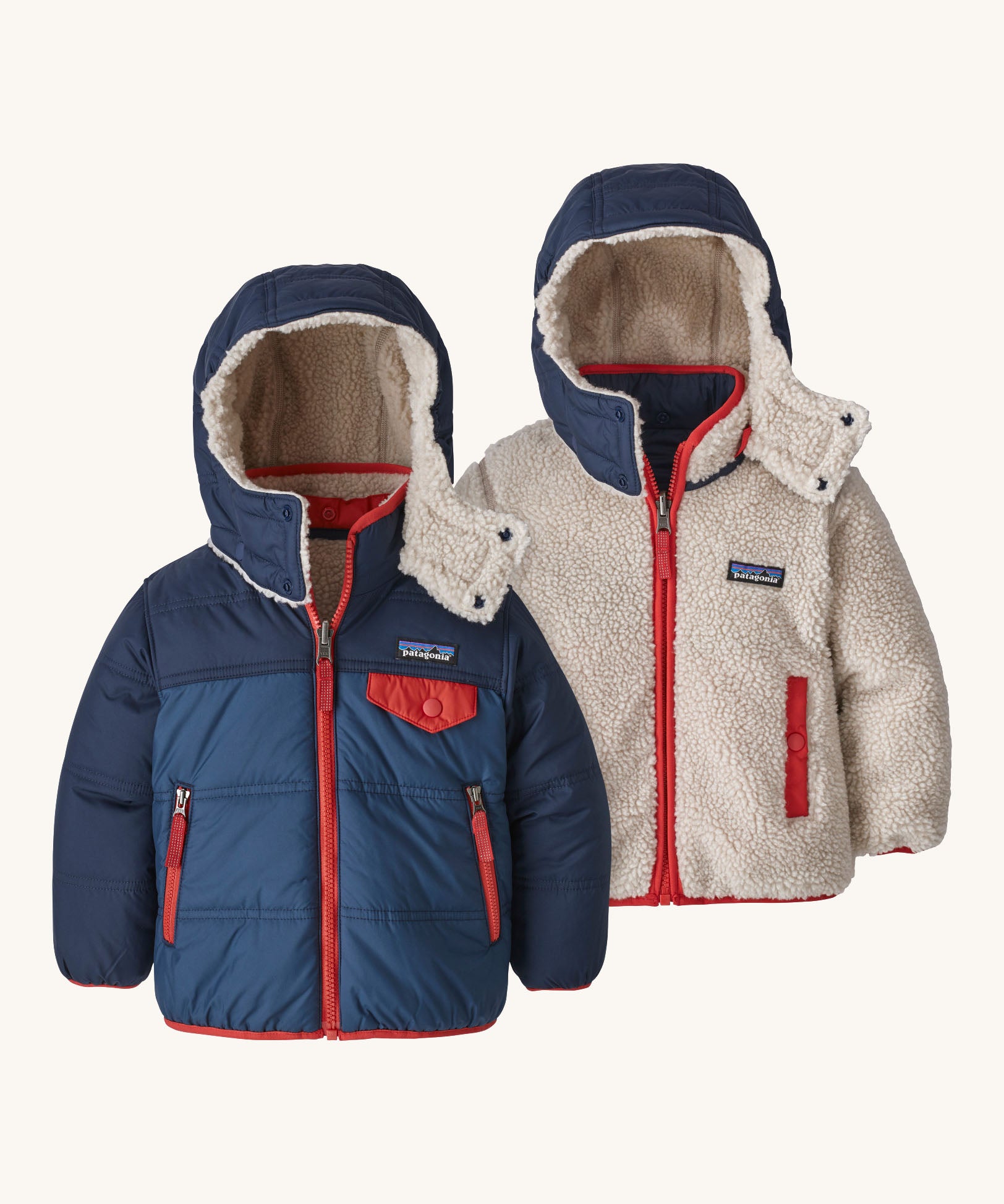Patagonia reversible little kids tribbles hoody coat in blue with red trim and fleece reverse. Features a small chest pocket and side pockets