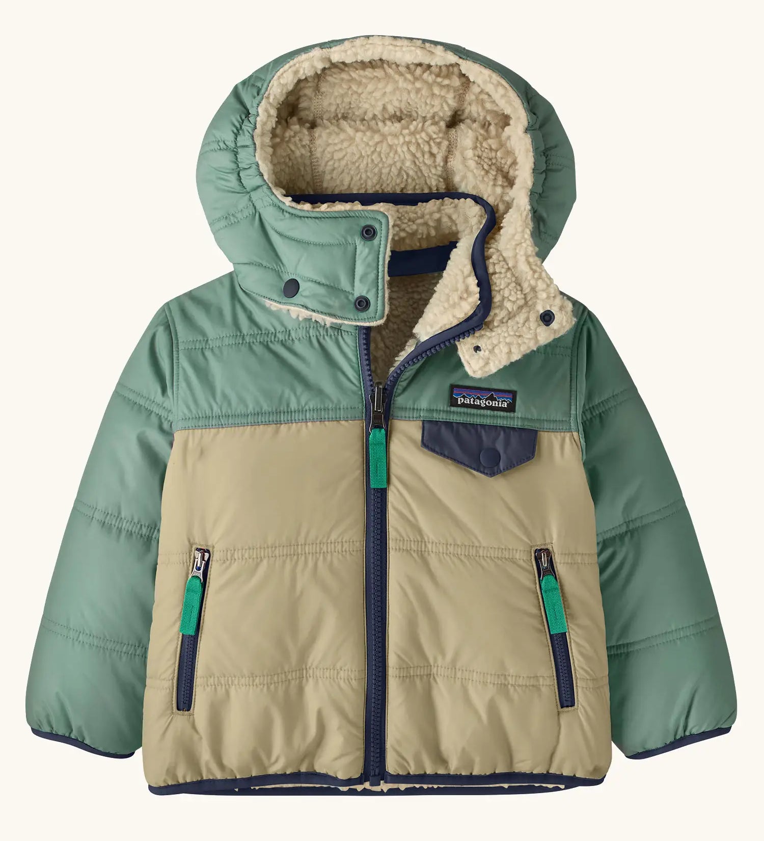 Patagonia reversible little kids tribbles hoody in sage green with a fleece inner for warmth. Features a removable hood, chest and side pockets