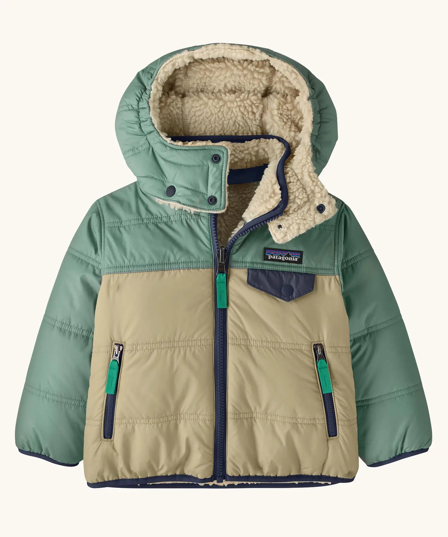 Patagonia reversible little kids tribbles hoody in sage green with a fleece inner for warmth. Features a removable hood, chest and side pockets