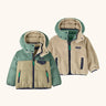 Patagonia reversible little kids tribbles hoody coat in sage green and stone lower half and fleece reverse. Features a small chest pocket and side pockets