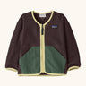 Patagonia baby fleece shearlings jacket in brown with yellow trim. Features a full length zip and green front pockets