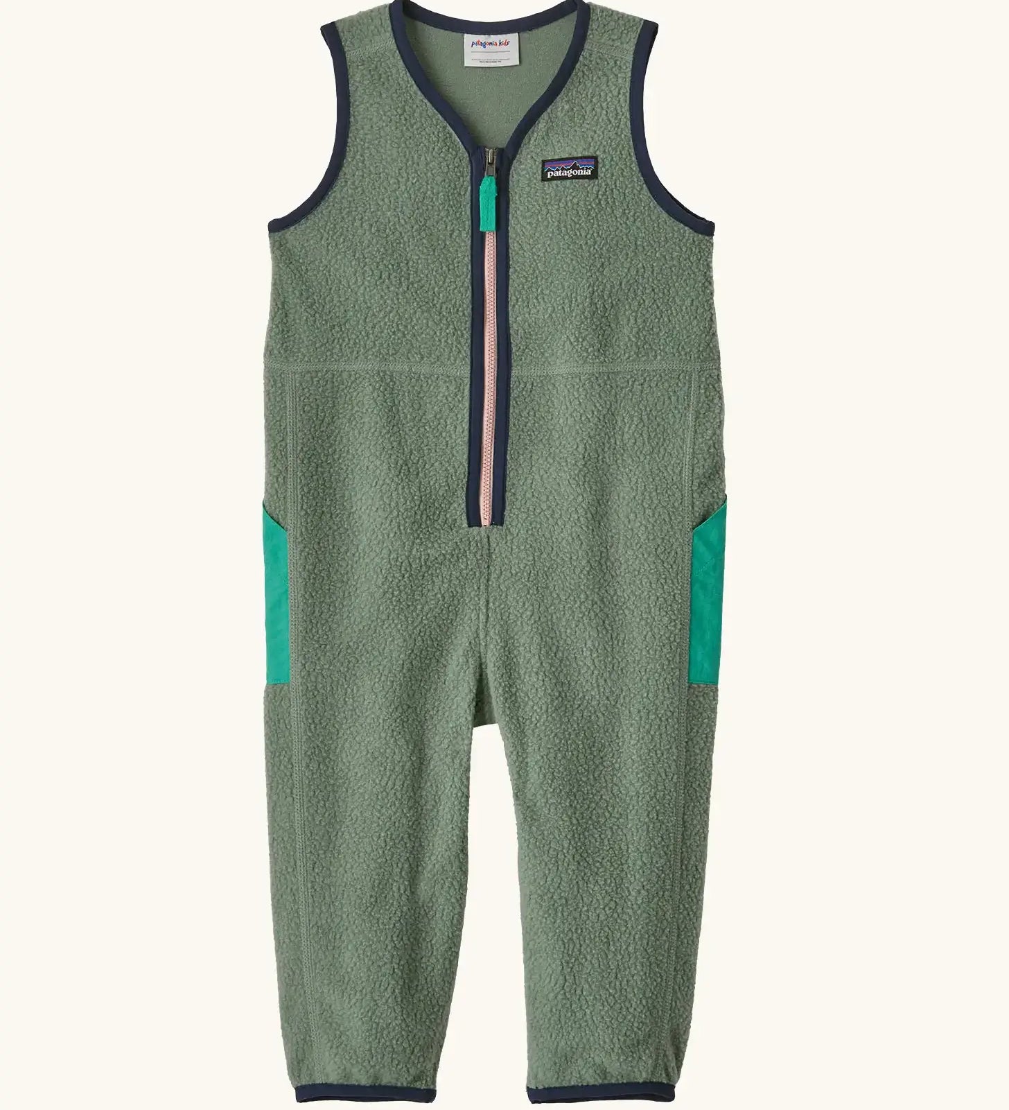 Patagonia baby fleeced shearlings overalls in green with navy trim. Features a half length zip and side pockets