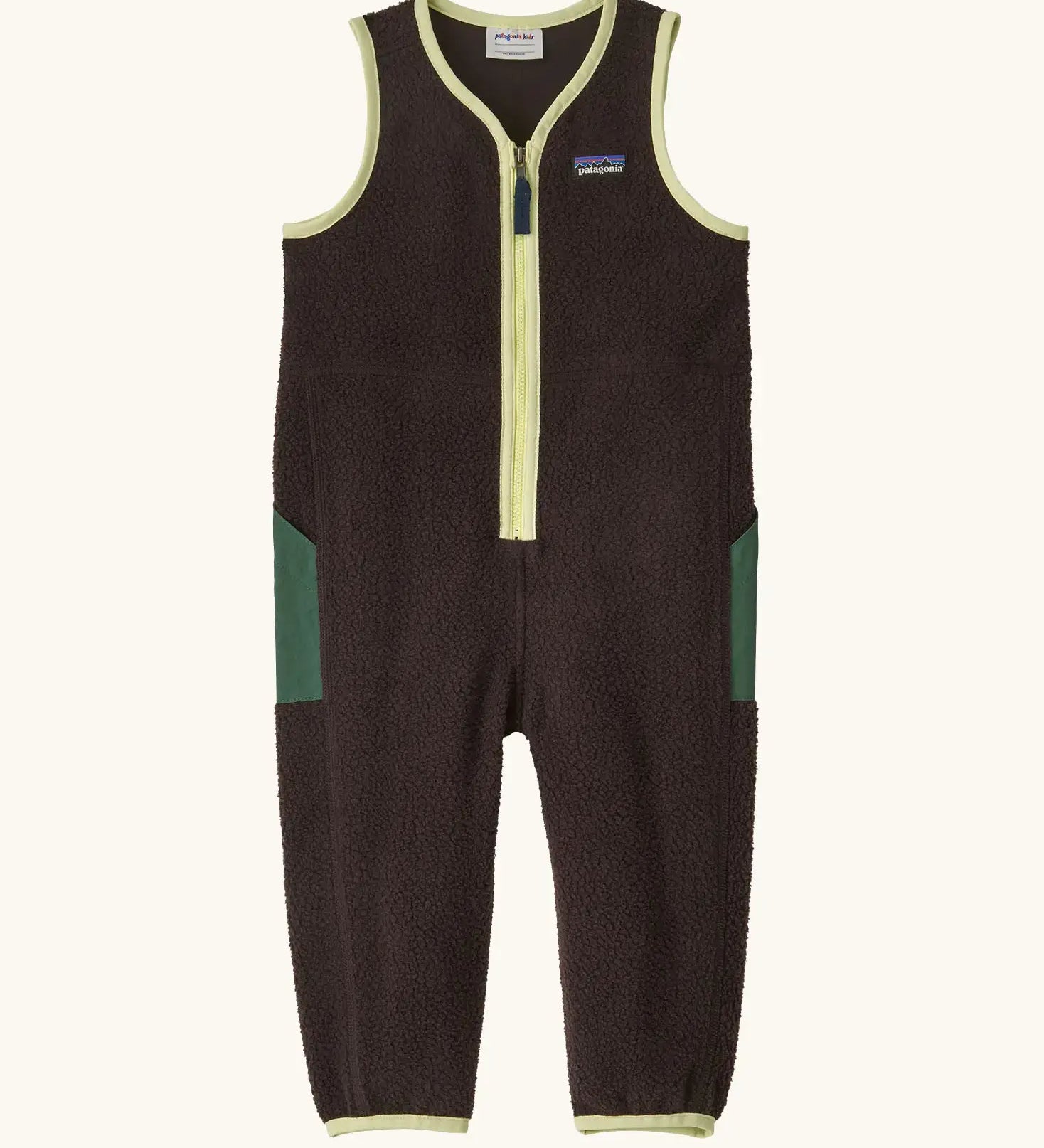 Patagonia baby fleeced shearlings overalls in brown with yellow trim. Features a half length zip and green side pockets