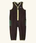 Patagonia baby fleeced shearlings overalls in brown with yellow trim. Features a half length zip and green side pockets