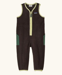 Patagonia baby fleeced shearlings overalls in brown with yellow trim. Features a half length zip and green side pockets