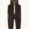Patagonia baby fleeced shearlings overalls in brown with yellow trim. Features a half length zip and green side pockets