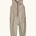 Patagonia baby fleeced shearlings overalls in beige with pale pink trim. Features a half length zip and side pockets