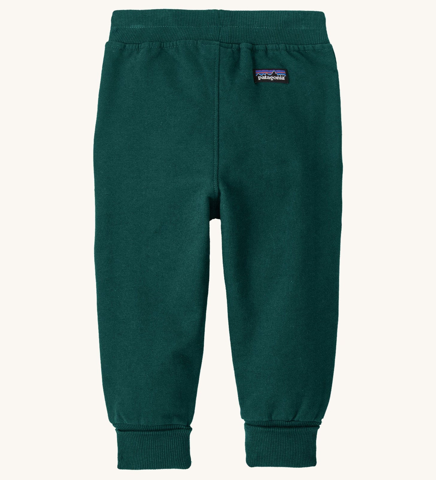 The back of the Patagonia Baby Sweatpants in a dark Cascade Green colour available at Babipur. Features a brand patch and elasticated cuffs.