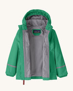 Opened Patagonia little kids torrentshell 3 layer rain jacket in green showing grey inner lining 
