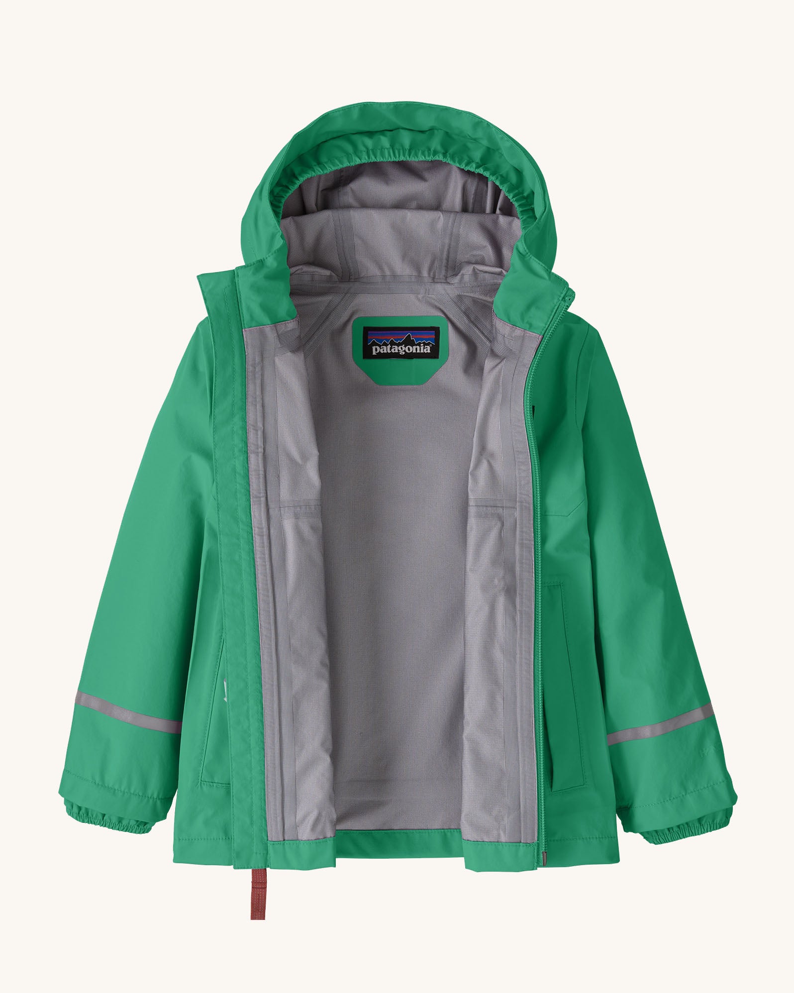 Opened Patagonia little kids torrentshell 3 layer rain jacket in green showing grey inner lining 