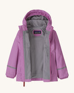 Opened Patagonia little kids torrentshell 3 layer rain jacket in bright purple showing grey inner lining 