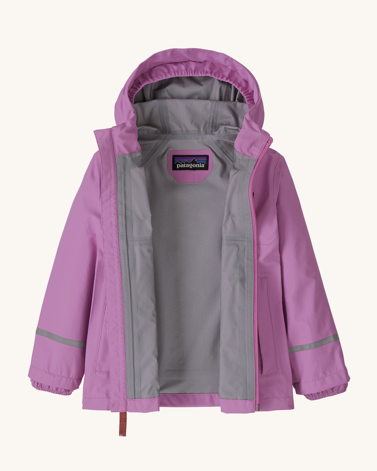 Opened Patagonia little kids torrentshell 3 layer rain jacket in bright purple showing grey inner lining 