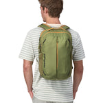 A person wearing a Patagonia Refugio Day Pack 26L