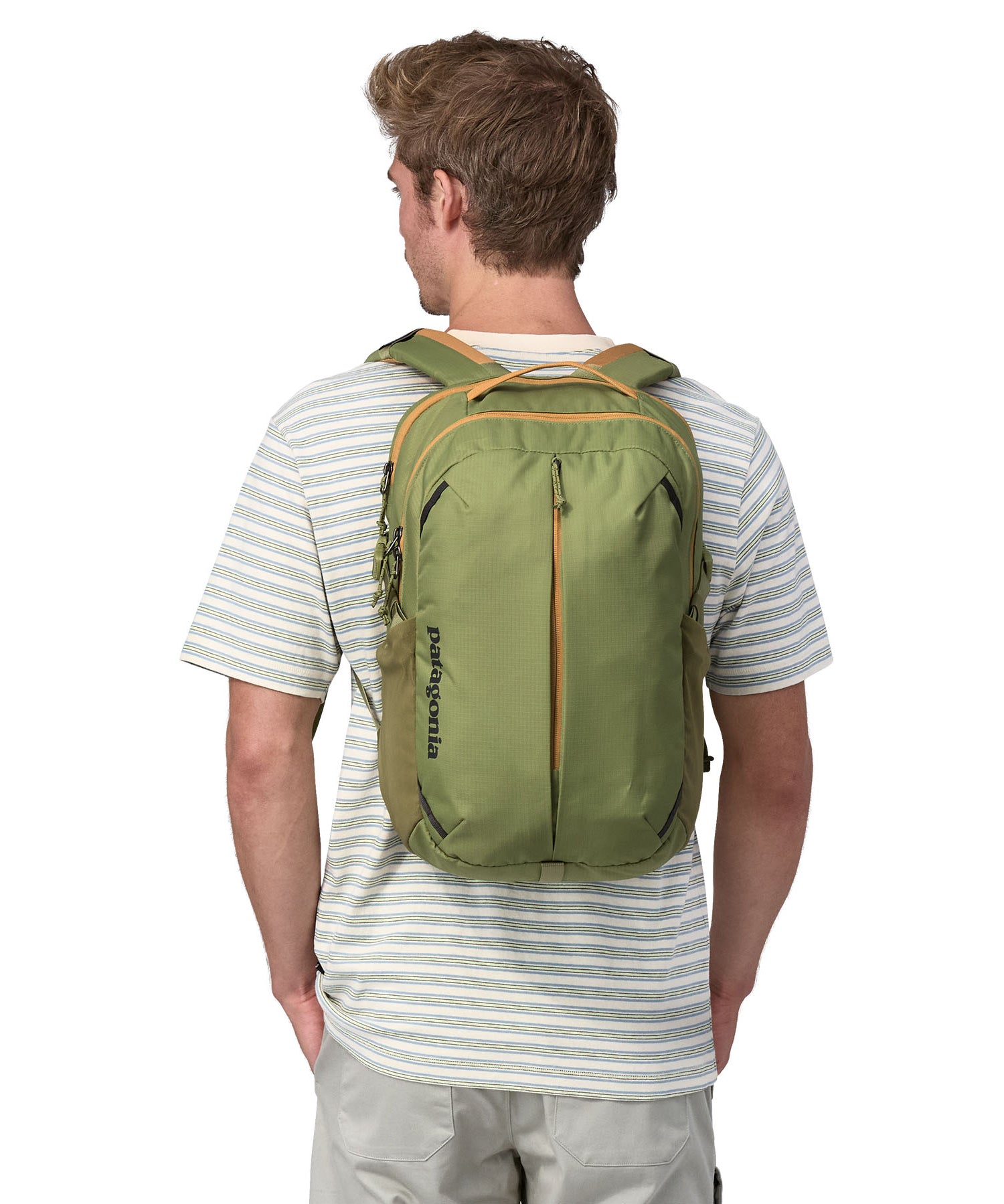 A person wearing a Patagonia Refugio Day Pack 26L