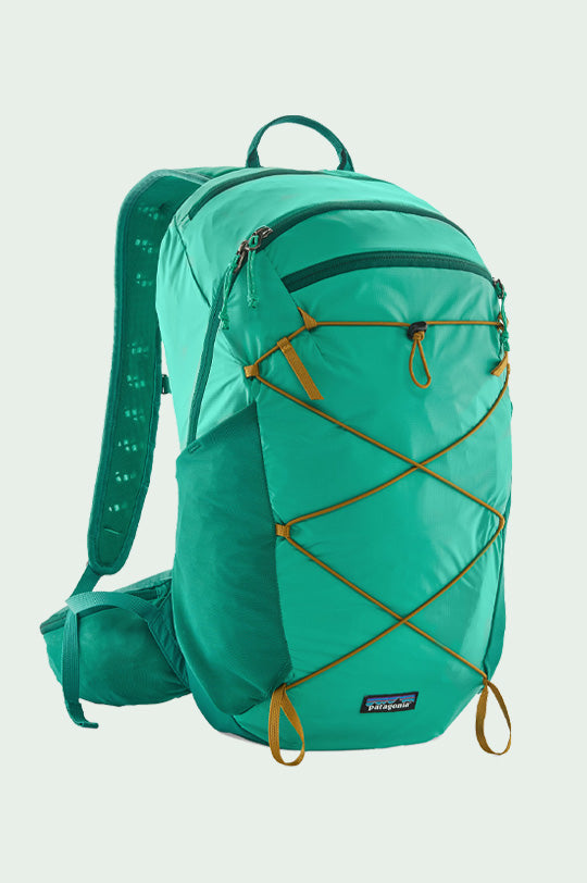 Patagonia Terravia Backpack 22L in Aqua teal with padded straps and hip belt, bottle side pockets and yellow elasticated bungee straps to represent ne Patagonia bags at Babipur.