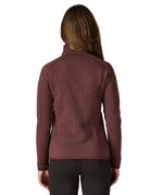 The back of a woman wearing the Patagonia women's better sweater jacket in dark ruby available at Babipur.