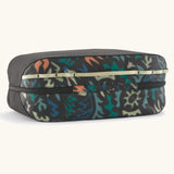 Underside of the Patagonia black hole 14 litre cube bag in black with abstract pattern showing zip running underneath 