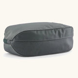 Underside of Patagonia black hole cube 3 litre bag in black in grey