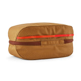 The back of the Patagonia black hole 6 litre cube bag in talon gold available at Babipur. showing the main zip compartment running around the bag