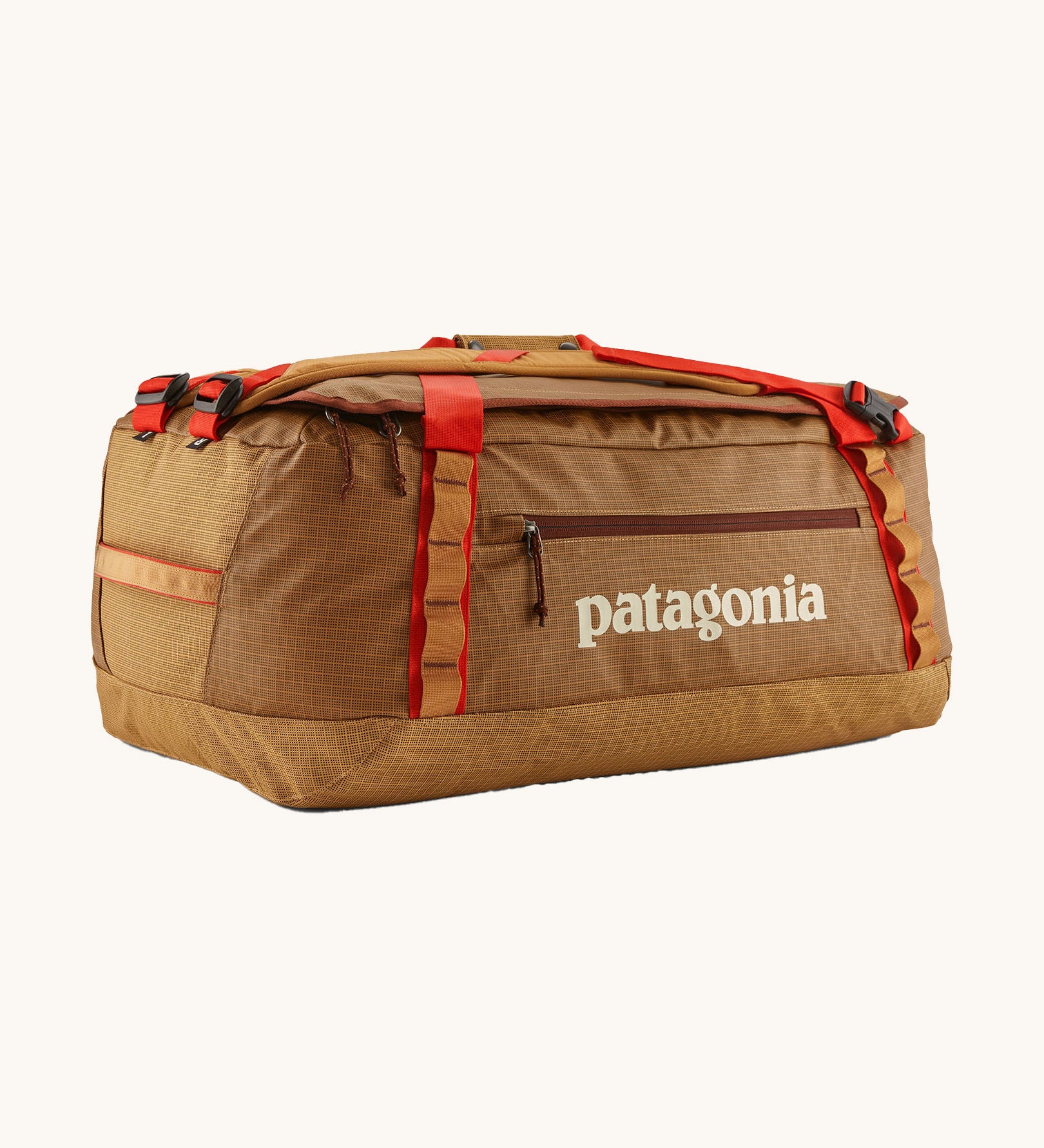 Patagonia black hole 55L duffel bag in talon gold available at Babipur. A dark yellow colour bag with red trim and a cream colour branding  on the side. Features shoulders straps and a handle on the top for easy carrying.