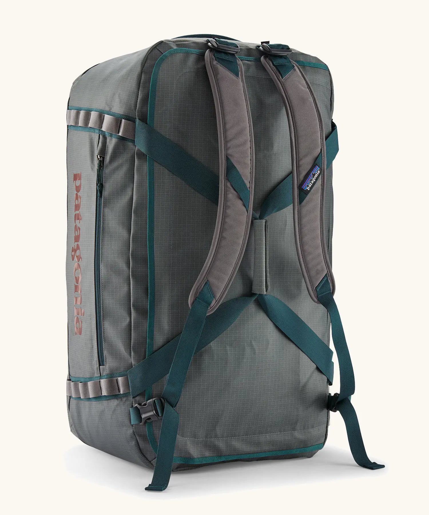 Back of  Patagonia black hole 70L duffel bag in noble grey available at Babipur showing the shoulder and extra carry straps