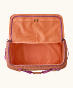 Open Patagonia black hole 70l duffel bag in bright orange showing extra zipped mesh compartments on inside lid