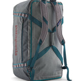 A close up of the Patagonia black hole 100L duffel bag in noble grey available at Babipur showing the shoulder straps and carry straps detail