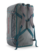 A close up of the Patagonia black hole 100L duffel bag in noble grey available at Babipur showing the shoulder straps and carry straps detail