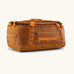 Patagonia black hole 40l duffel bag in cinnamon brown with matching zip details, carry straps and orange logo printed on the side