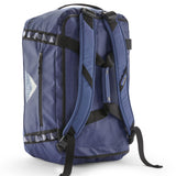 A close up of the Patagonia black hole 40l duffel bag in current blue available at Babipur showing the shoulder straps and carry straps detail