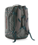 A close up of the Patagonia black hole 40l duffel bag in noble grey available at Babipur showing the shoulder straps and carry straps detail