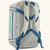 Patagonia black hole 55L duffel bag  in birch white with padded back straps.