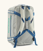 Patagonia black hole 55L duffel bag  in birch white with padded back straps.