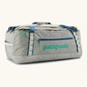 Patagonia black hole 55l duffel bag in birch white with blue zip details and mint green printed logo.