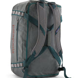 A close up of the Patagonia black hole 55L duffel bag in noble grey available at Babipur showing the shoulder straps and carry straps detail