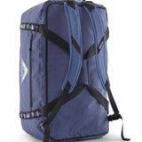 A close up of the Patagonia black hole 70L duffel bag in current blue available at Babipur showing the shoulder straps and carry straps detail