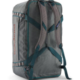 A close up of the Patagonia black hole 70L duffel bag in noble grey available at Babipur showing the shoulder straps and carry straps detail