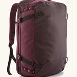 Patagonia 45 litre black hole weather resistant travel backpack in maroon. Features padded shoulder pads, zipper fasteners and a carry handle