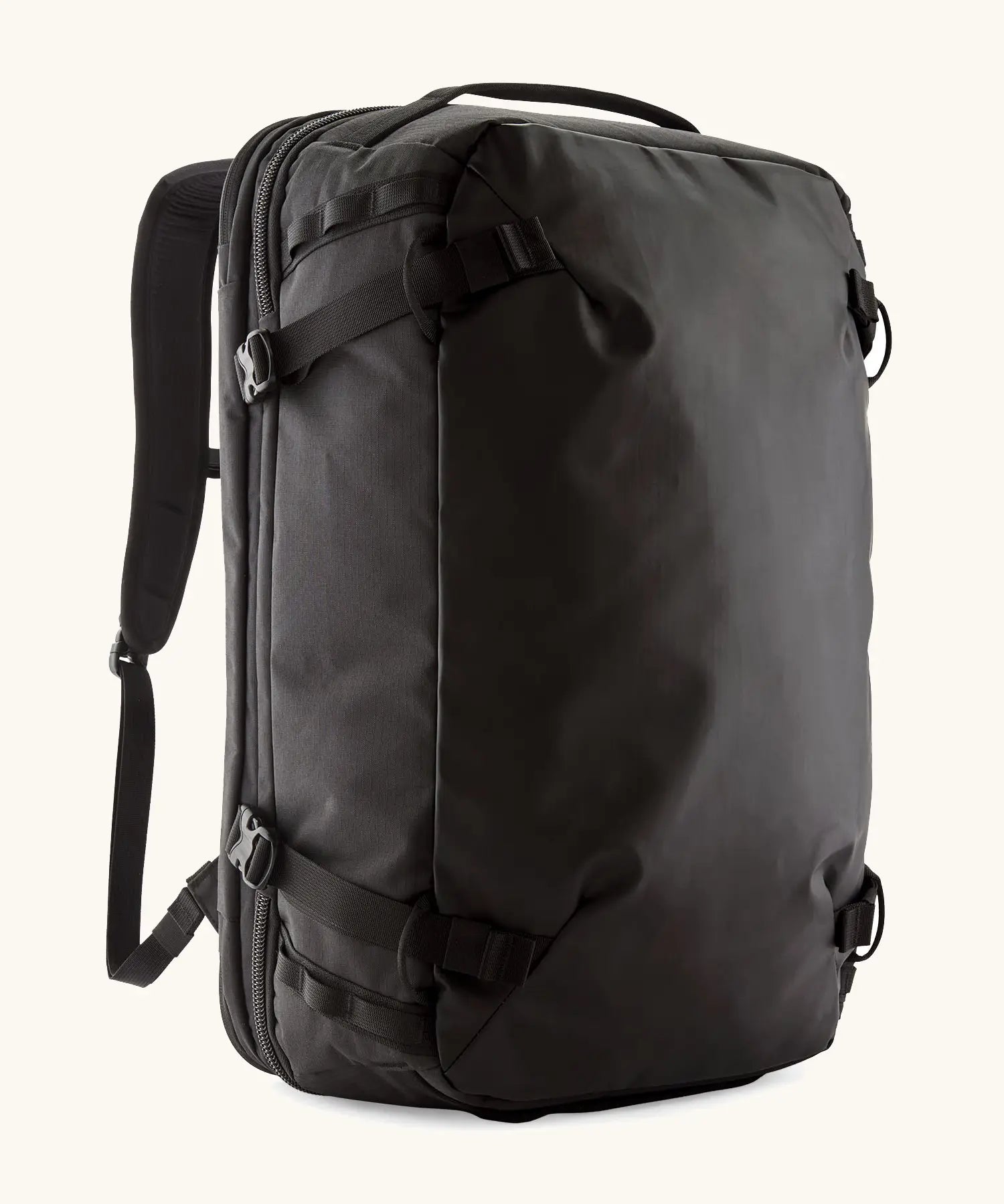 Patagonia 45 litre black hole weather resistant travel backpack in all black. Features padded shoulder pads, zipper fasteners and a carry handle