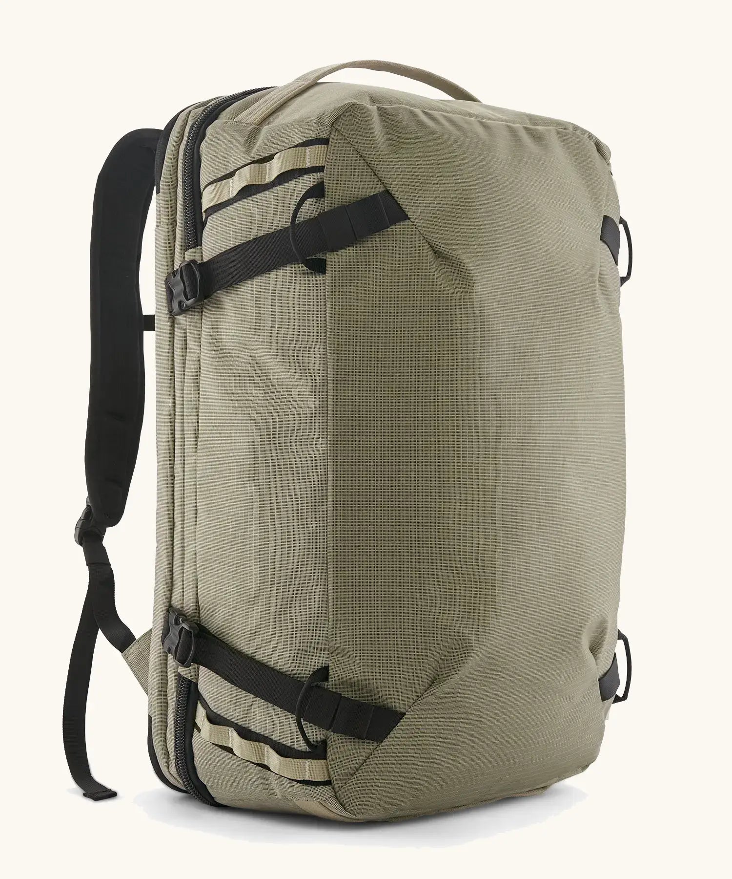 Patagonia 45 litre black hole weather resistant travel backpack in beige with black trim. Features padded shoulder pads, zipper fasteners and a carry handle
