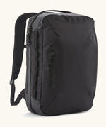 Patagonia 22 litre black hole weather resistant micro travel backpack in black. Features padded shoulder pads, zipper fasteners and extra loops for attaching items