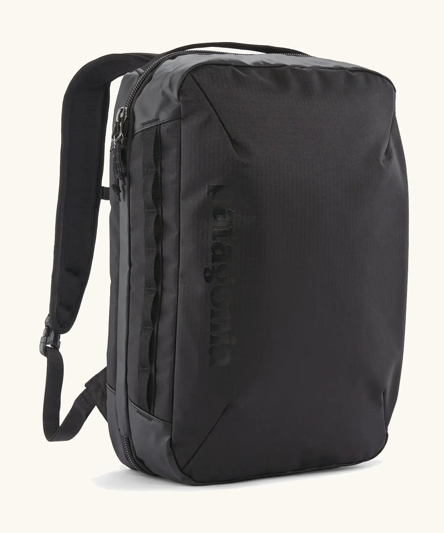 Patagonia 22 litre black hole weather resistant micro travel backpack in black. Features padded shoulder pads, zipper fasteners and extra loops for attaching items