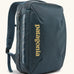 Patagonia 22 litre black hole weather resistant micro travel backpack in teal. Features padded shoulder pads, zipper fasteners and extra loops for attaching items