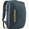 Patagonia 22 litre black hole weather resistant micro travel backpack in teal. Features padded shoulder pads, zipper fasteners and extra loops for attaching items