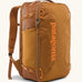Patagonia 30 litre black hole weather resistant travel backpack in rust brown. Features padded shoulder pads, zipper fasteners and mesh side pocket