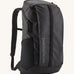 A Patagonia Black Hole Backpack 25 litre capacity backpack in all black available at Babipur. This backpack features a main zipped compartment, a compartment on the top and meshed side pockets.