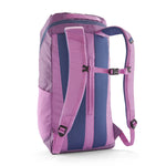 The back of the Patagonia black hole 25 litre backpack in brisk purple available at Babipur showing the padded shoulder straps and buckle fastener on the chest strap