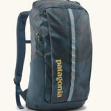 Patagonia 100% recycled polyester black hole 25 litre backpack in teal. Features padded shoulder straps, top compartment and mesh side pockets