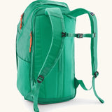 Patagonia black hole backpack 32L in bright green with matching shoulder straps and black quick release buckle