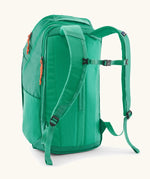 Patagonia black hole backpack 32L in bright green with matching shoulder straps and black quick release buckle
